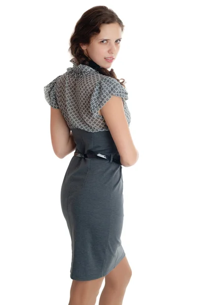 Flicka i en grå klänning — Stockfoto