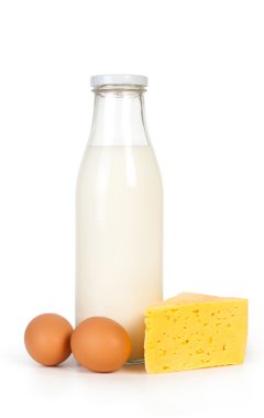 Milk products and eggs. Milk bottle, eggs and cheese. clipart