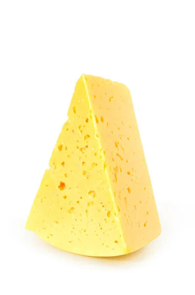 Pedaço de queijo isolado sobre um fundo branco — Fotografia de Stock