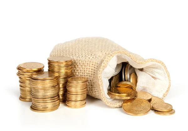 Geld in de zak en stapel van munten — Stockfoto