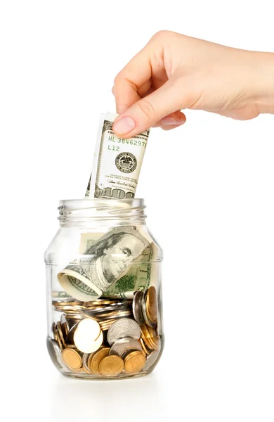 Glass bank for tips with money and hand — Stock Photo, Image