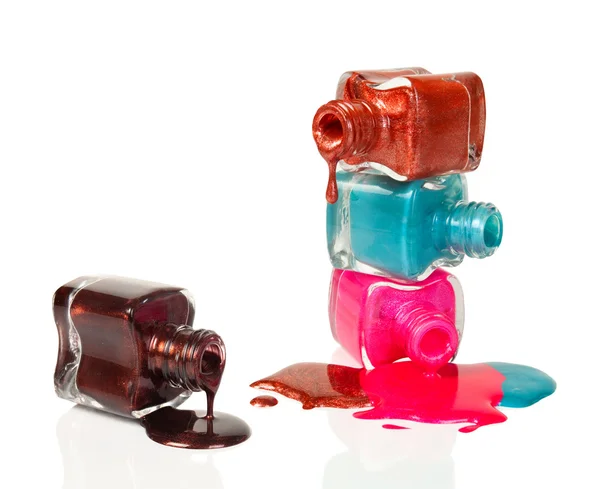 Botellas con esmalte de uñas derramado —  Fotos de Stock