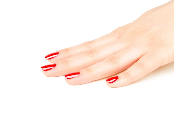 Nahaufnahme weiblicher Hände mit roter Maniküre — Stockfoto