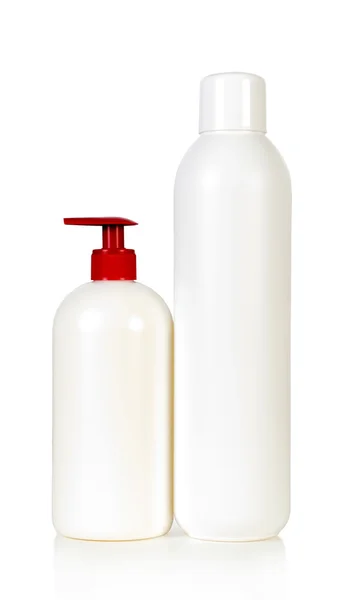 Dwa puste butelki szamponu i włosy protektor — Zdjęcie stockowe