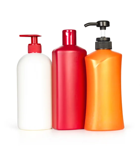Tři prázdné lahve šamponu, — Stock fotografie