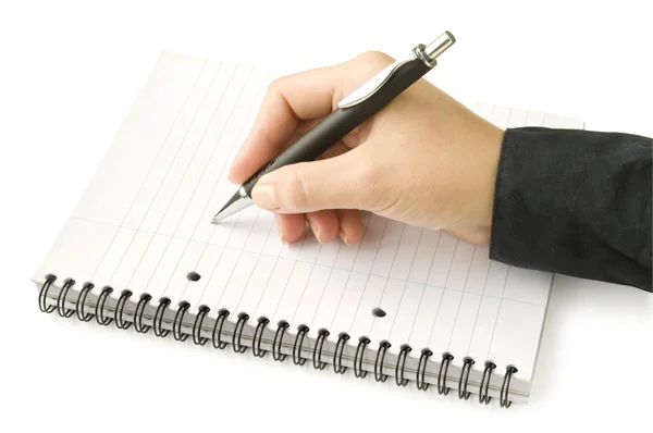 Pen in de hand schrijven op de notebook — Stockfoto