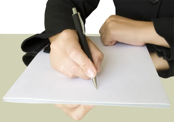 Hand met pen schrijven over het Witboek — Stockfoto