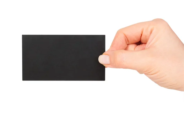 Hand som håller blank svart papper visitkort — Stockfoto