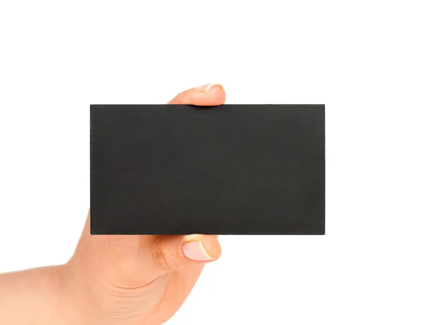 Hand holding blank black paper business card — Stock Photo, Image