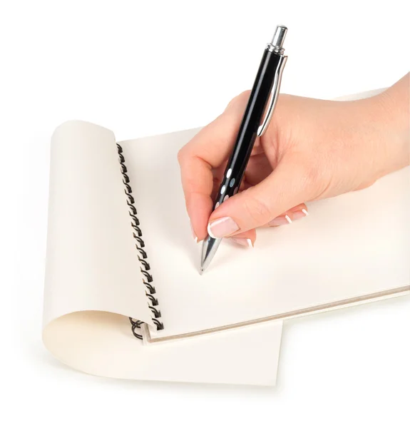 Писать от руки в тетрадке — стоковое фото