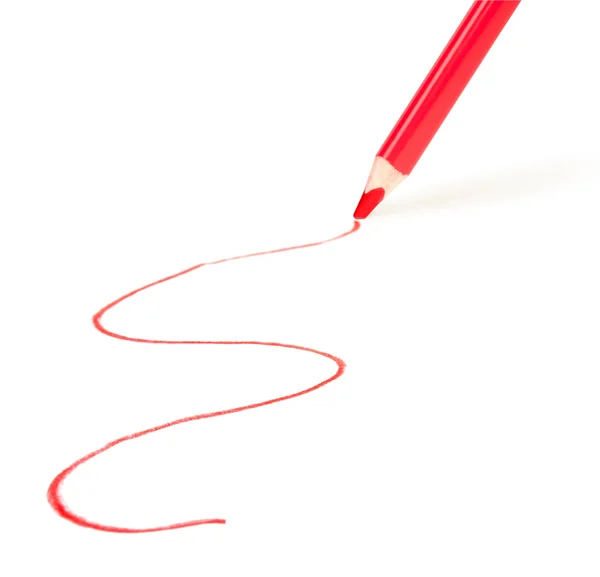 Crayon rouge dessinant une ligne — Photo
