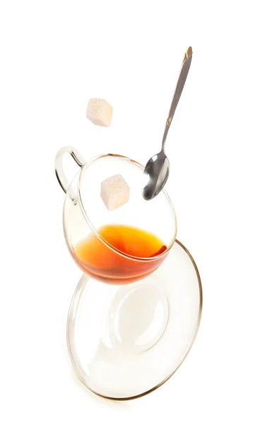 Cup of tea with a spoon and sugar — Stock Photo, Image