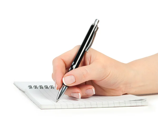 Hand met pen schrijven op notebook Rechtenvrije Stockafbeeldingen