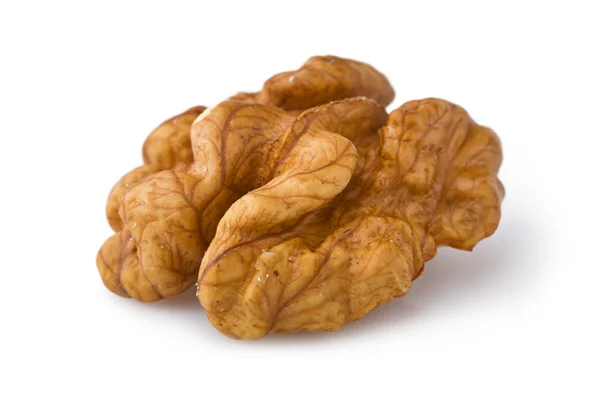 Extreme close-up of walnut seed isolated on white — Stock Photo, Image