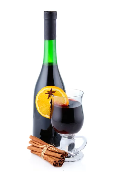 Bottle of red wine anf cup of mulled wine isolated — Stock Photo, Image