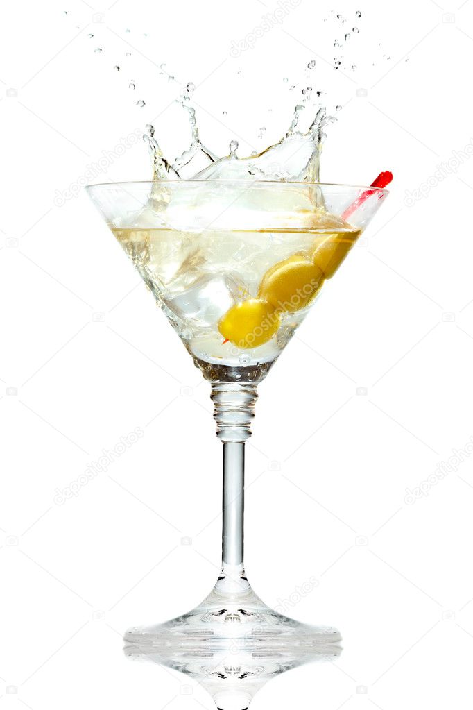 Olive splashing on martini glass isolated on white