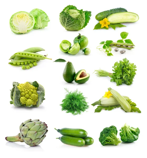 Conjunto de verduras verdes frescas aisladas en blanco Imagen de stock