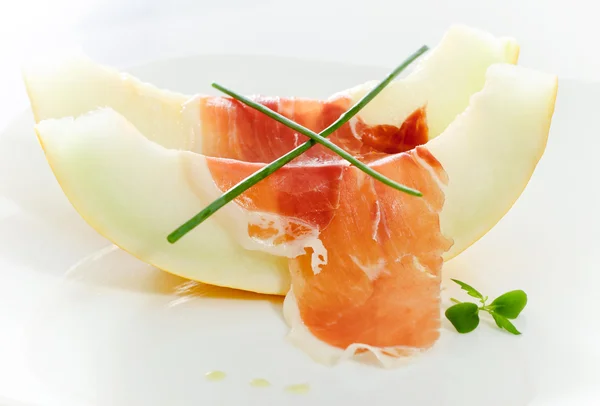 stock image Delicious sliced melon and bacon