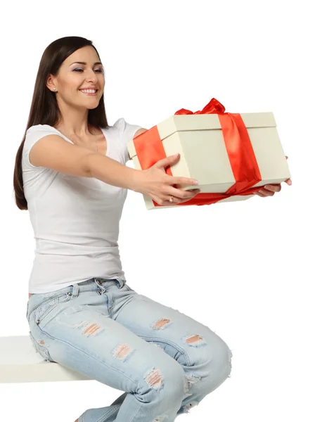 Beautiful young brunette girl with present — Stok fotoğraf