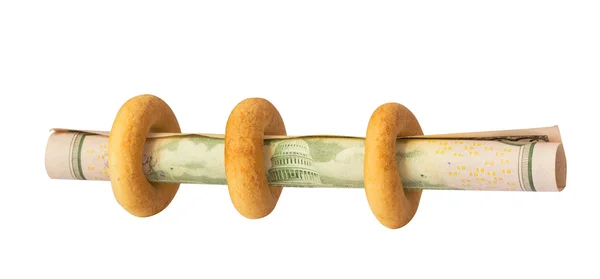 Bagels with dollars — Stock Photo, Image