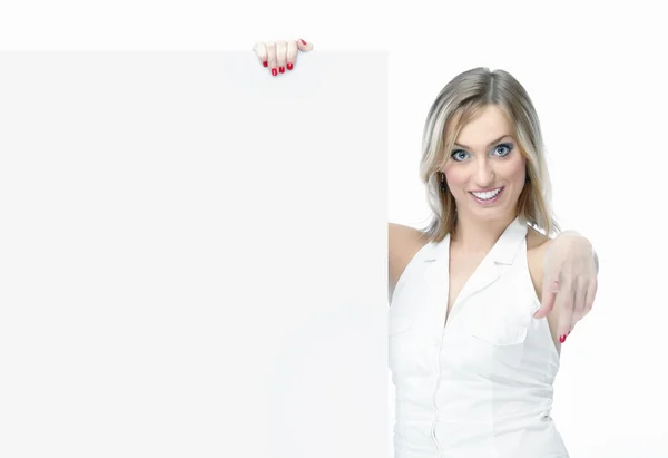 Stock image Smiling woman holding a blank billboard