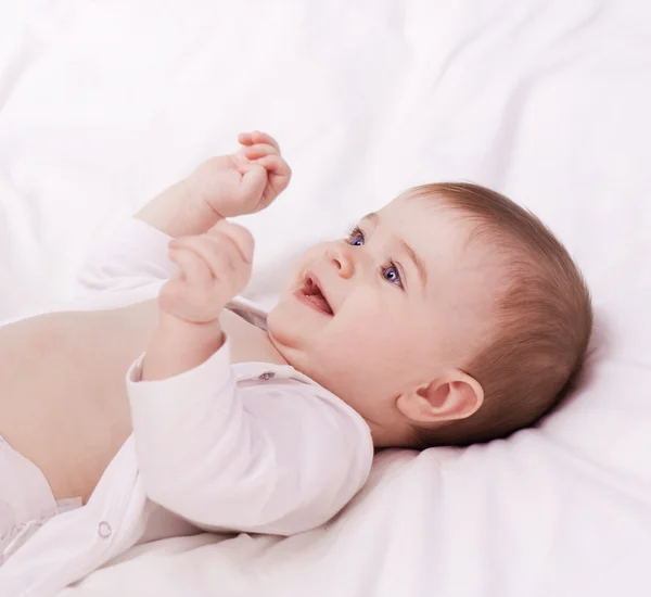 Pequeno sorriso bebê — Fotografia de Stock
