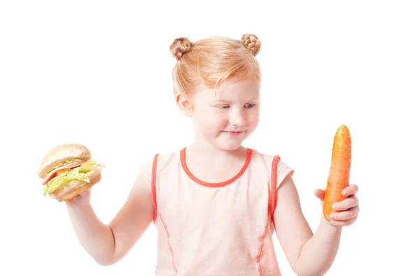 Chica con zanahorias y hot dog —  Fotos de Stock