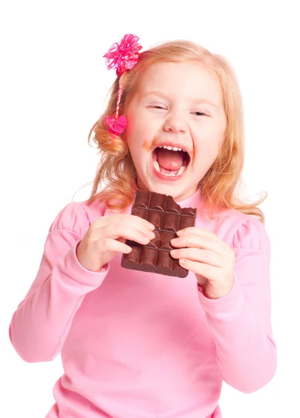 Sorriso menina com chocolate — Fotografia de Stock