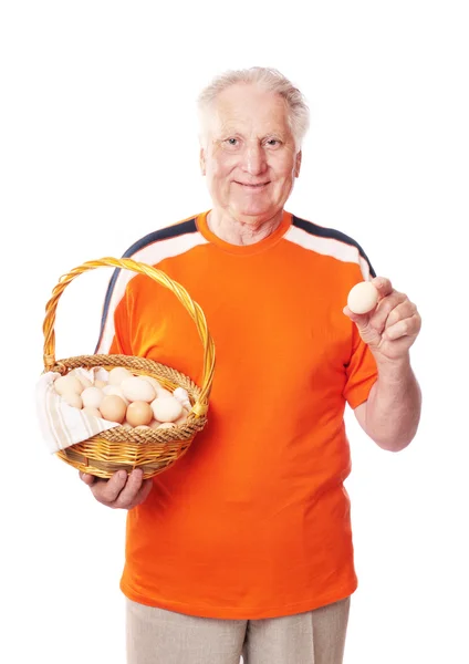 Пожилые мужчины с яйцами — стоковое фото
