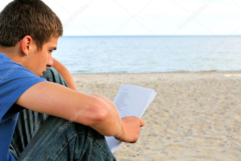 Teenager read letter outdoor