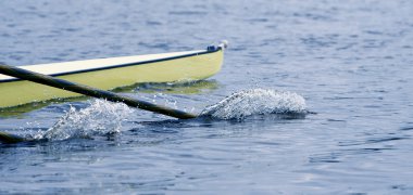 Academic boat with water spray clipart