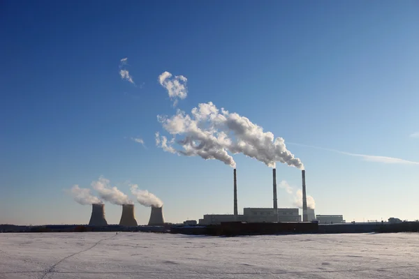 stock image Power plant in snow field