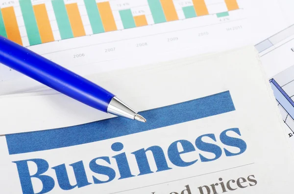 Business the newspaper with chart — Stock Photo, Image