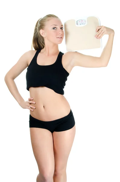 Sportovní holka s váhy izolované na bílém pozadí — Stock fotografie