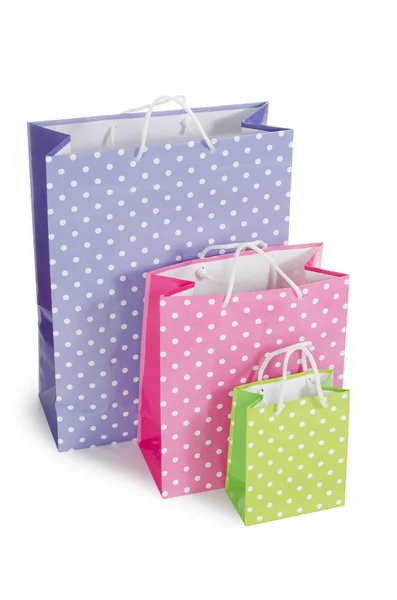 Bright gift bags isolated on white — Stock Photo, Image