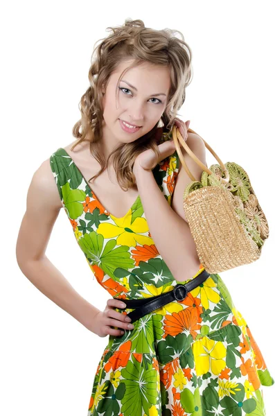 stock image The beautiful girl in a summer dress isolated