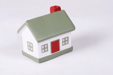 Model house on grey background clipart