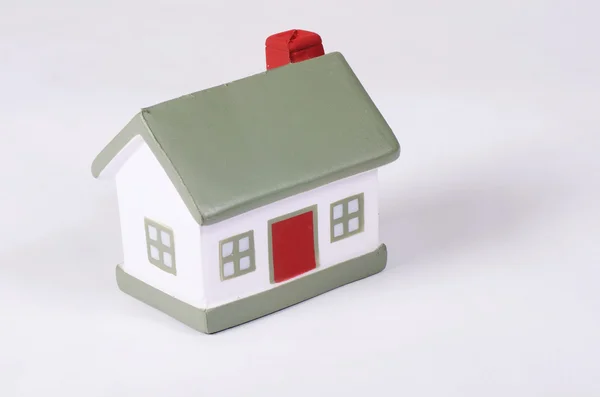 Model house on grey background — Stock Photo, Image