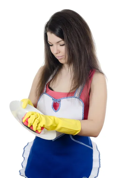 Dívka myje talíř izolovaných na bílém pozadí — Stock fotografie