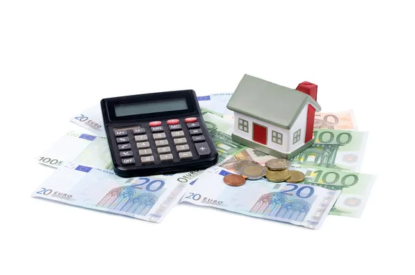 Toy house for euro banknotes as a background — Stock Photo, Image