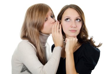 Two girl-friends tell gossips on an ear isolated clipart