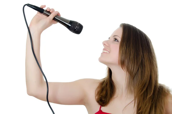 Девушка с микрофоном изолирована на белом — стоковое фото
