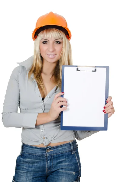Beautiful girl in a building helmet With clipboard — Stock Photo, Image