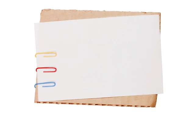 Carta a colori con una graffetta — Foto Stock