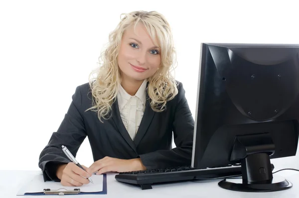 The young girl behind the computer — Stock Photo, Image