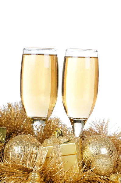 Champagne met Kerst ornamenten Stockfoto