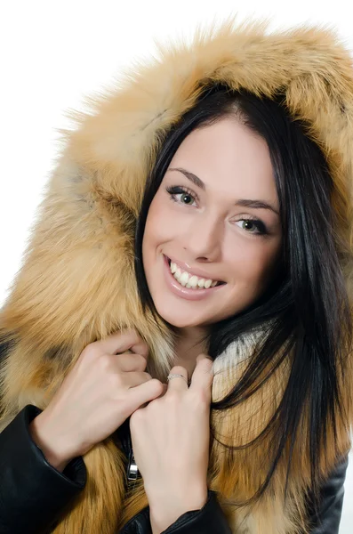 Beautiful girl in a fur hood — Stock Photo, Image