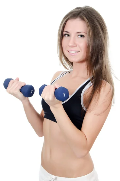 The girl does exercises with dumbbells — Stock Photo, Image