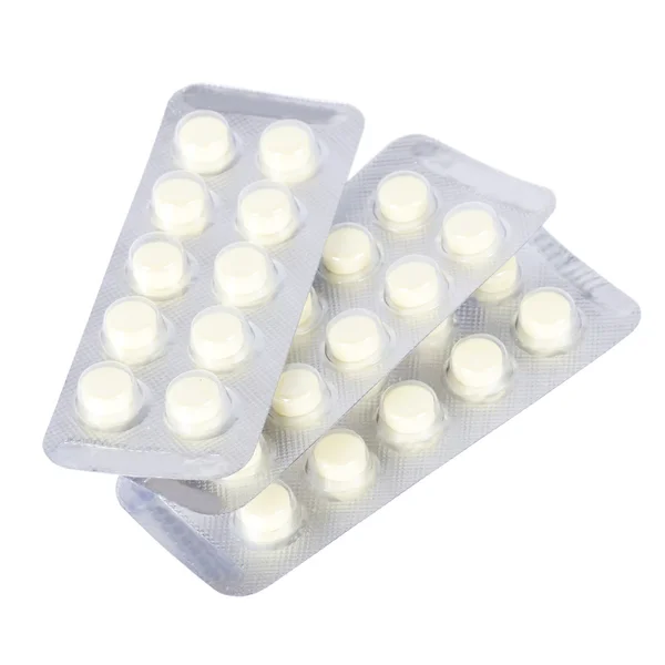 Embalagens de comprimidos isolados em branco — Fotografia de Stock