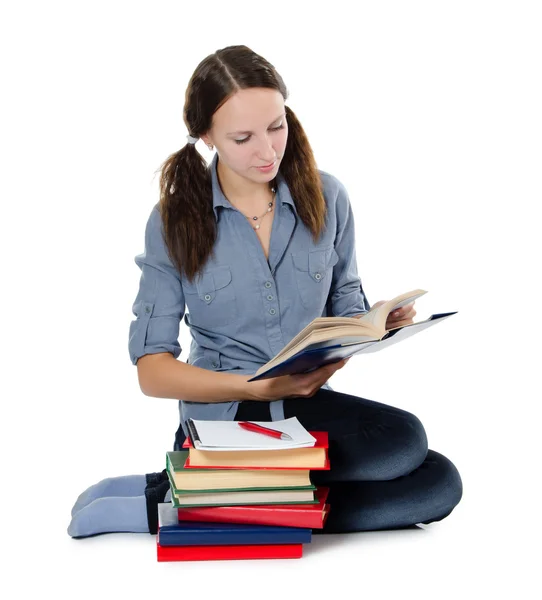 Het mooie meisje met boeken geïsoleerd op wit — Stockfoto